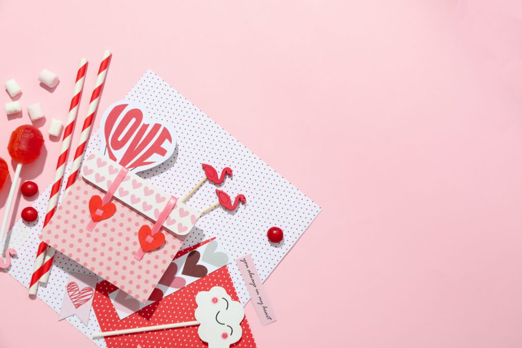Colourful sticker and heart decorations on a bright background
